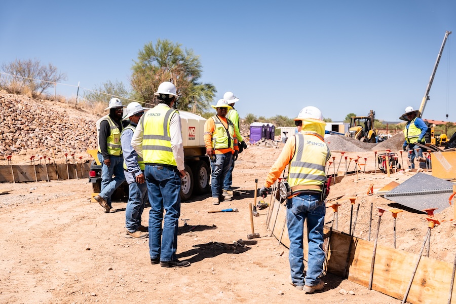 Team members meeting to discuss safety protocols